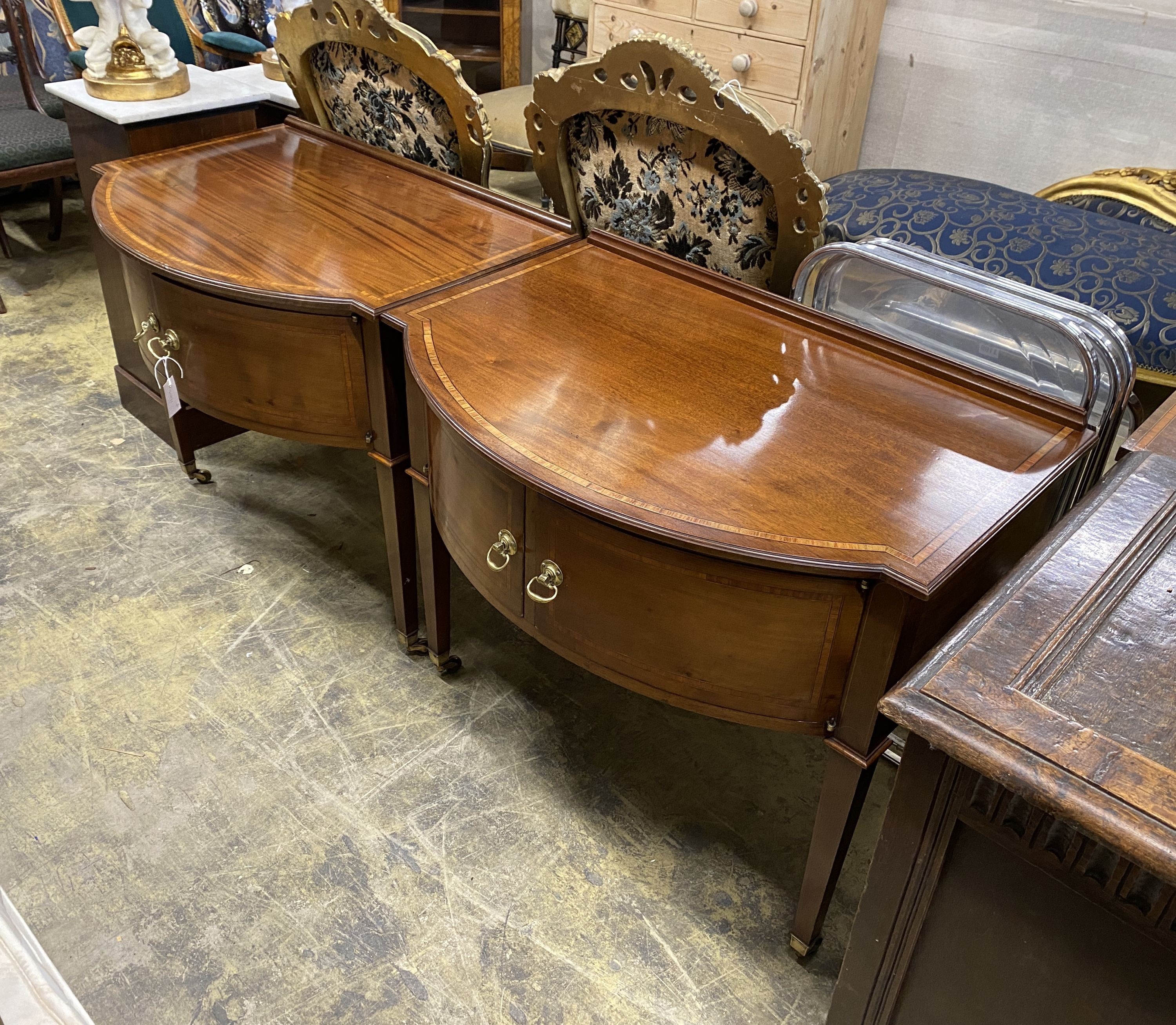 A pair of Edwardian satinwood banded mahogany bow front side cabinets, width 90cm, depth 60cm, height 78cm